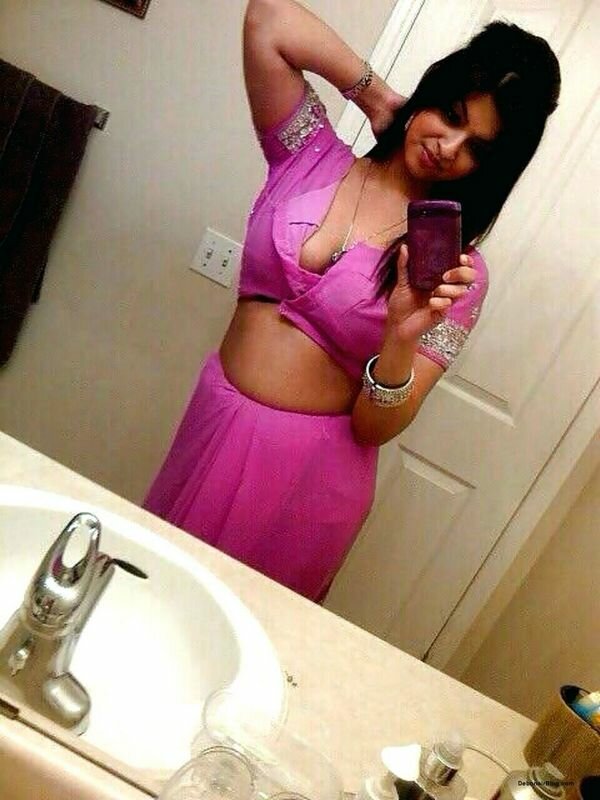 NRI girl stripping off pink saree and undies to show tits pussy selfie pics